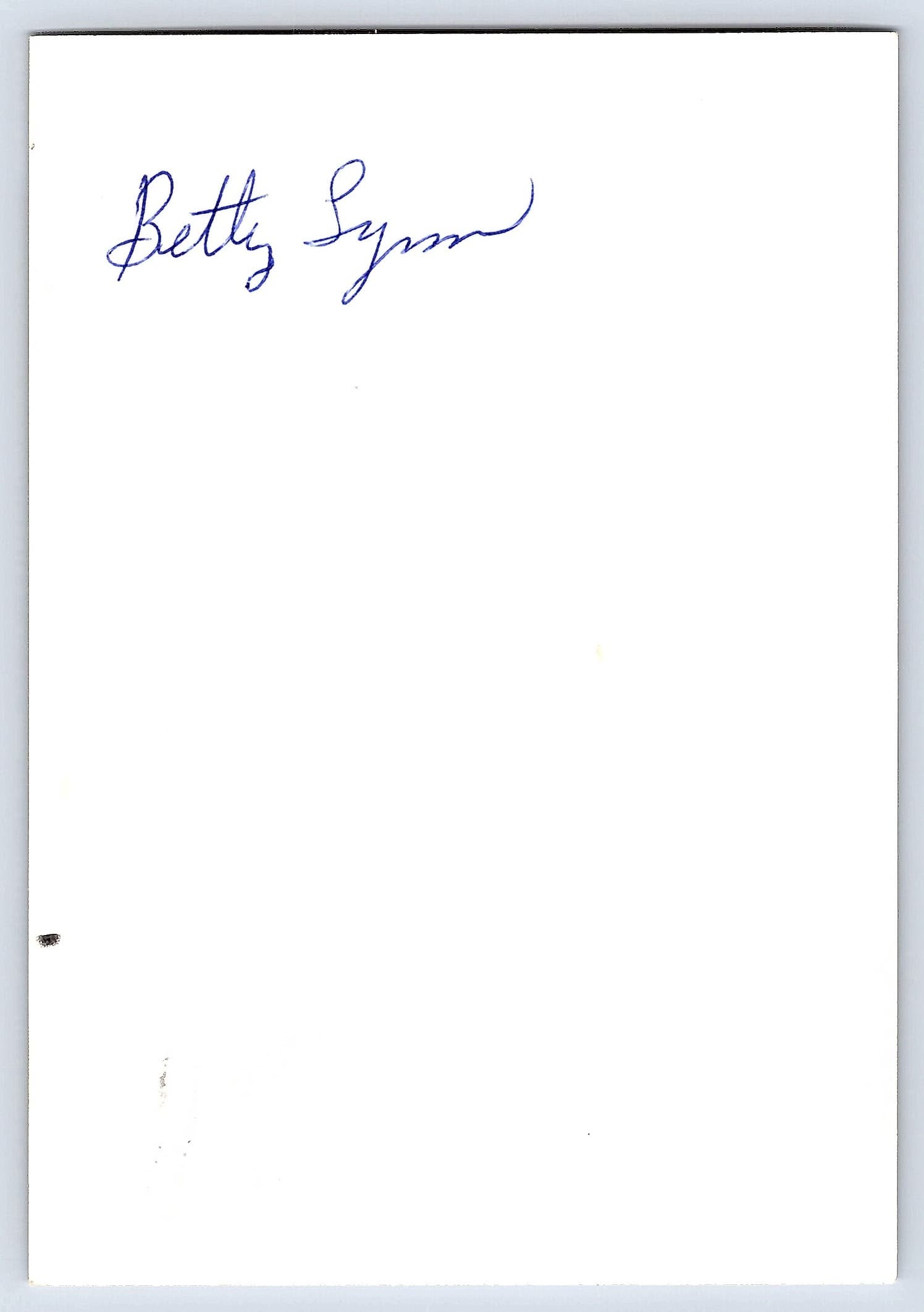 Girl in Plaid Dress, Black and White Photograph, 3.5 × 5 inches, 1970s - Back