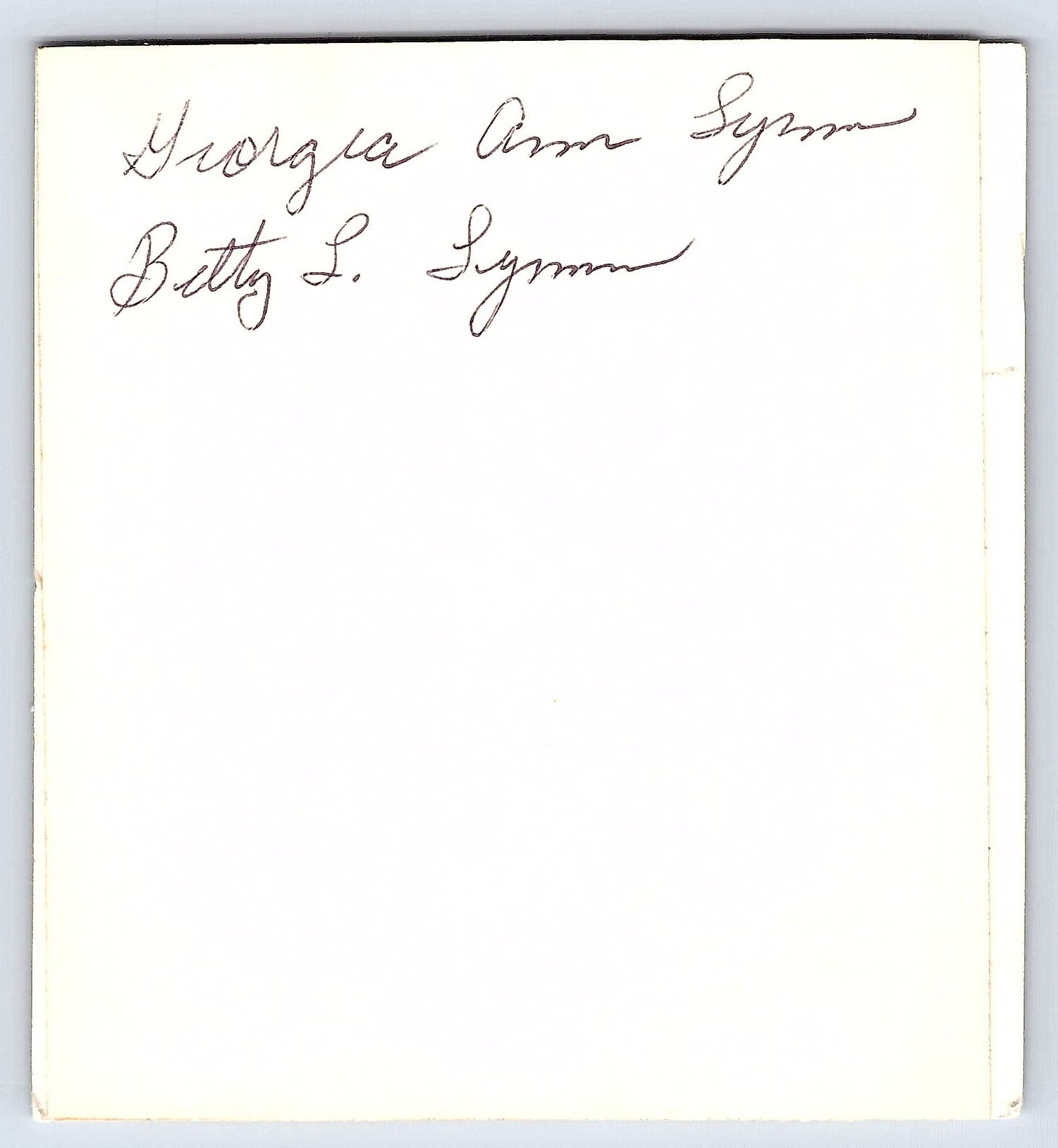 1960s Snapshot of Two Women in Matching Outfits, Backyard Setting - Back